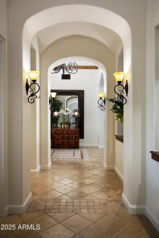 a bathroom with a sink vanity and mirror