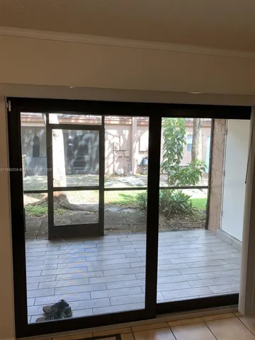 a bathroom with a shower and a tub