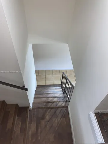 a view of a livingroom with furniture and closet