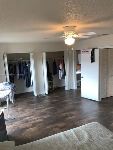 a white toilet sitting next to a toilet