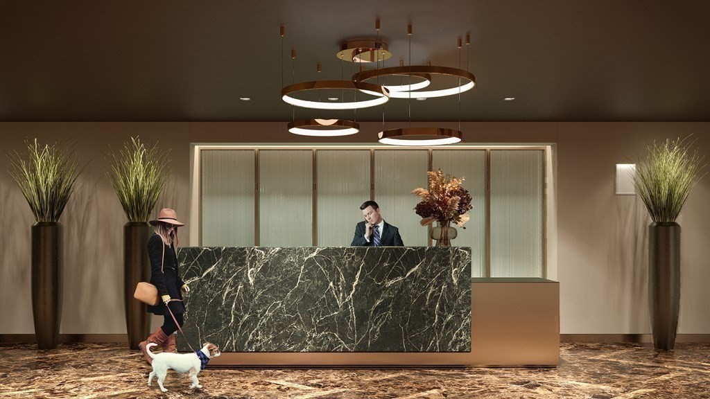 240 Devonshire Street, Unit 5014 Boston, MA 02110 - Photo 26 of 38 a view of a livingroom with furniture and floor to ceiling window