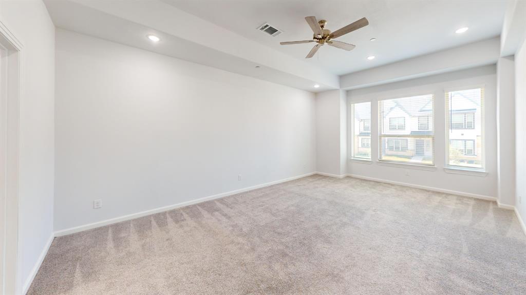 336 Buck Ridge Drive Frisco, TX 75068 - Photo 12 of 23 Spacious room featuring light gray carpet flooring, recessed lighting, and a ceiling fan