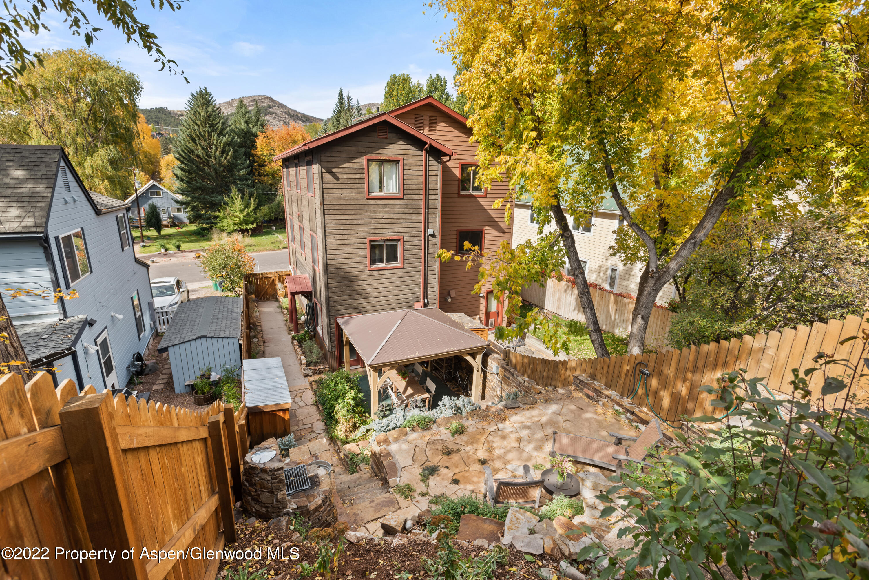 123 Swinging Bridge Lane Basalt, CO 81621 - Photo 2 of 15 a view of a chairs and table in the backyard