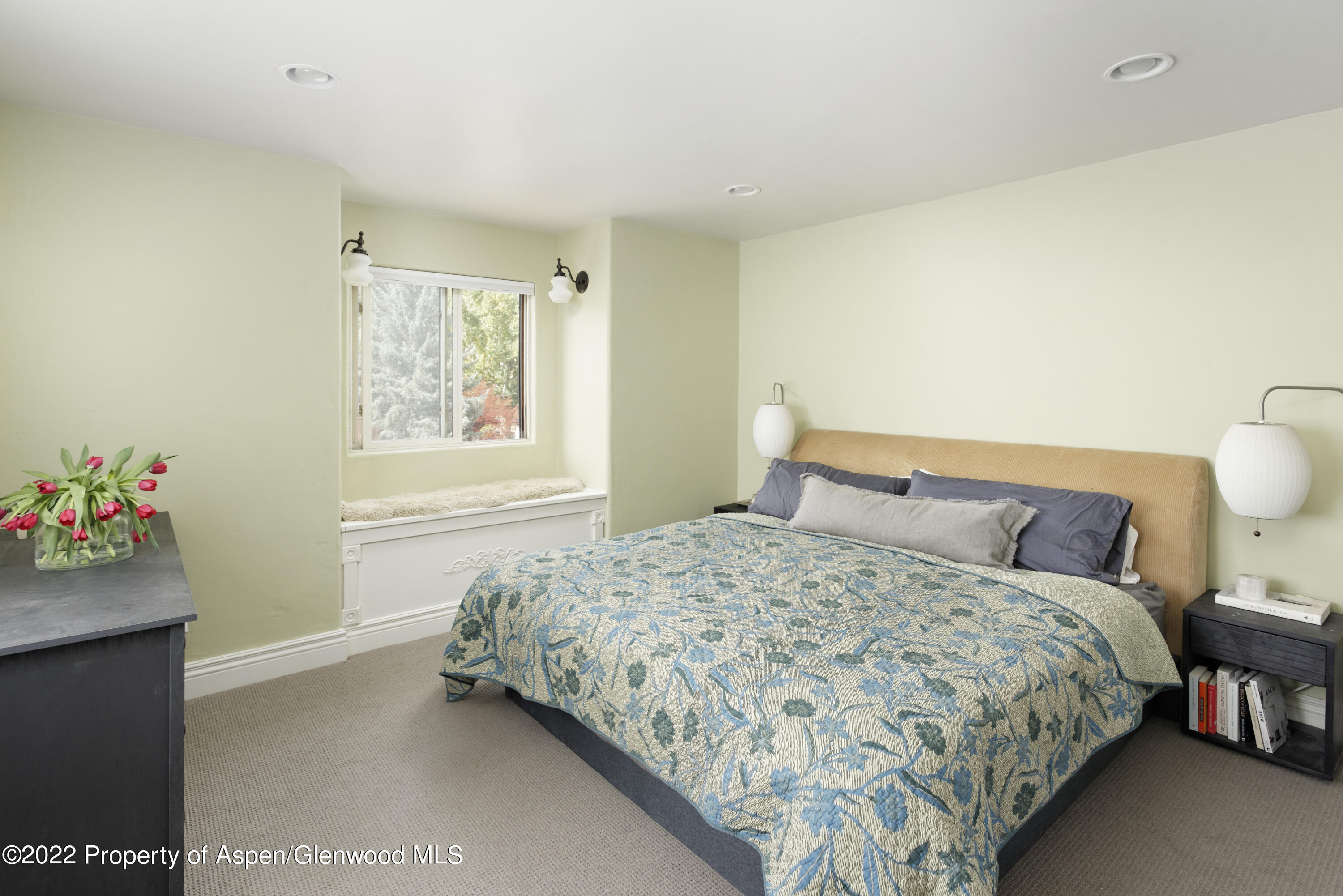 123 Swinging Bridge Lane Basalt, CO 81621 - Photo 10 of 15 a bedroom with a bed and a potted plant on the dresser