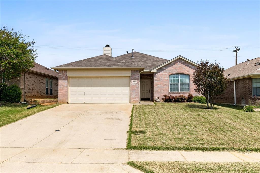 3505 Austin Street Gainesville, TX 76240 - Photo 1 of 20 a front view of a house with a yard