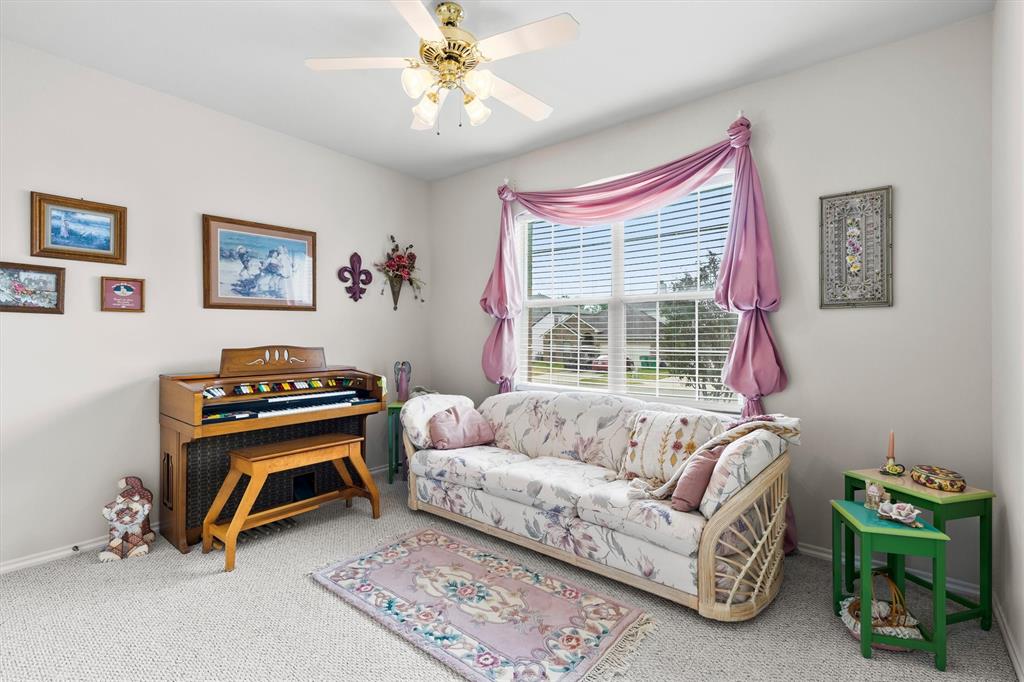3505 Austin Street Gainesville, TX 76240 - Photo 14 of 20 a living room with furniture and a window