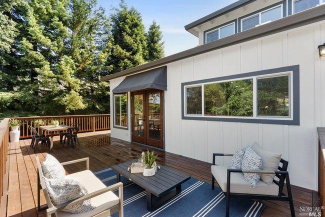 875 Watertrough Road Sebastopol, CA 95472 - Photo 1 of 1 a view of a patio with a dining table and chairs with wooden floor