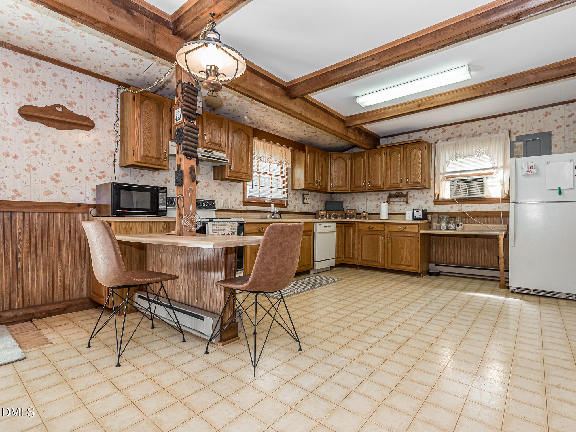 381 Royal Road Roseboro, NC 28382 - Photo 15 of 30 a kitchen with stainless steel appliances granite countertop a sink a stove a refrigerator cabinets and chairs