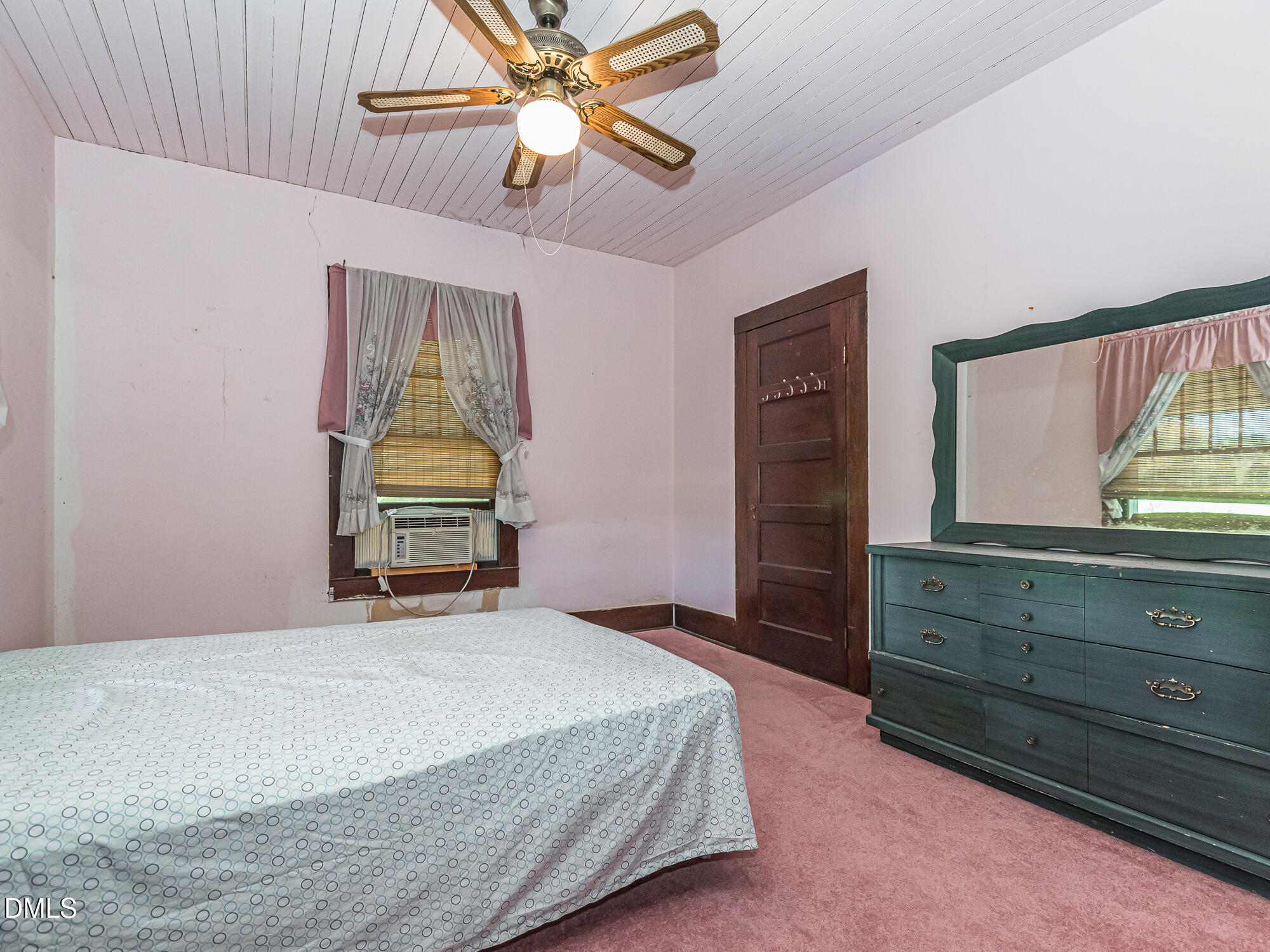 381 Royal Road Roseboro, NC 28382 - Photo 18 of 30 a bedroom with a bed and a dresser