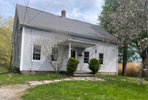 176 Corbin Road Dudley, MA 01571 - Photo 40 of 41 a front view of a house with garden