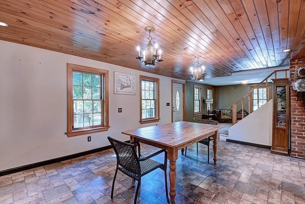 176 Corbin Road Dudley, MA 01571 - Photo 5 of 41 a room with furniture and window