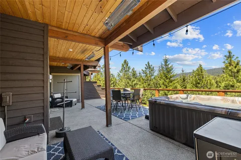 a view of a balcony with chairs
