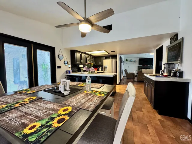 a large kitchen with kitchen island granite countertop lots of counter top space