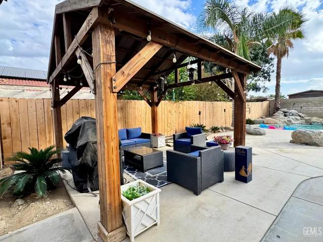 a view of a terrace with chairs