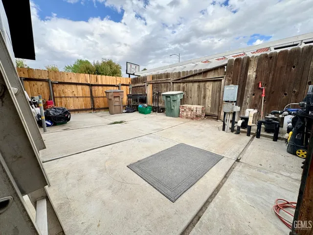 a refrigerator freezer sitting inside of a kitchen