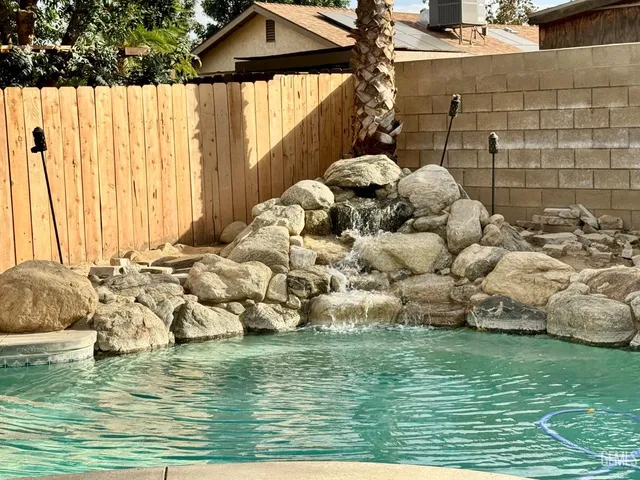 a view of a play house with swimming pool