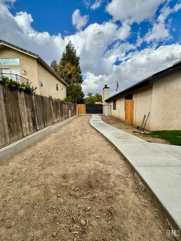 a view of living room with wooden floor