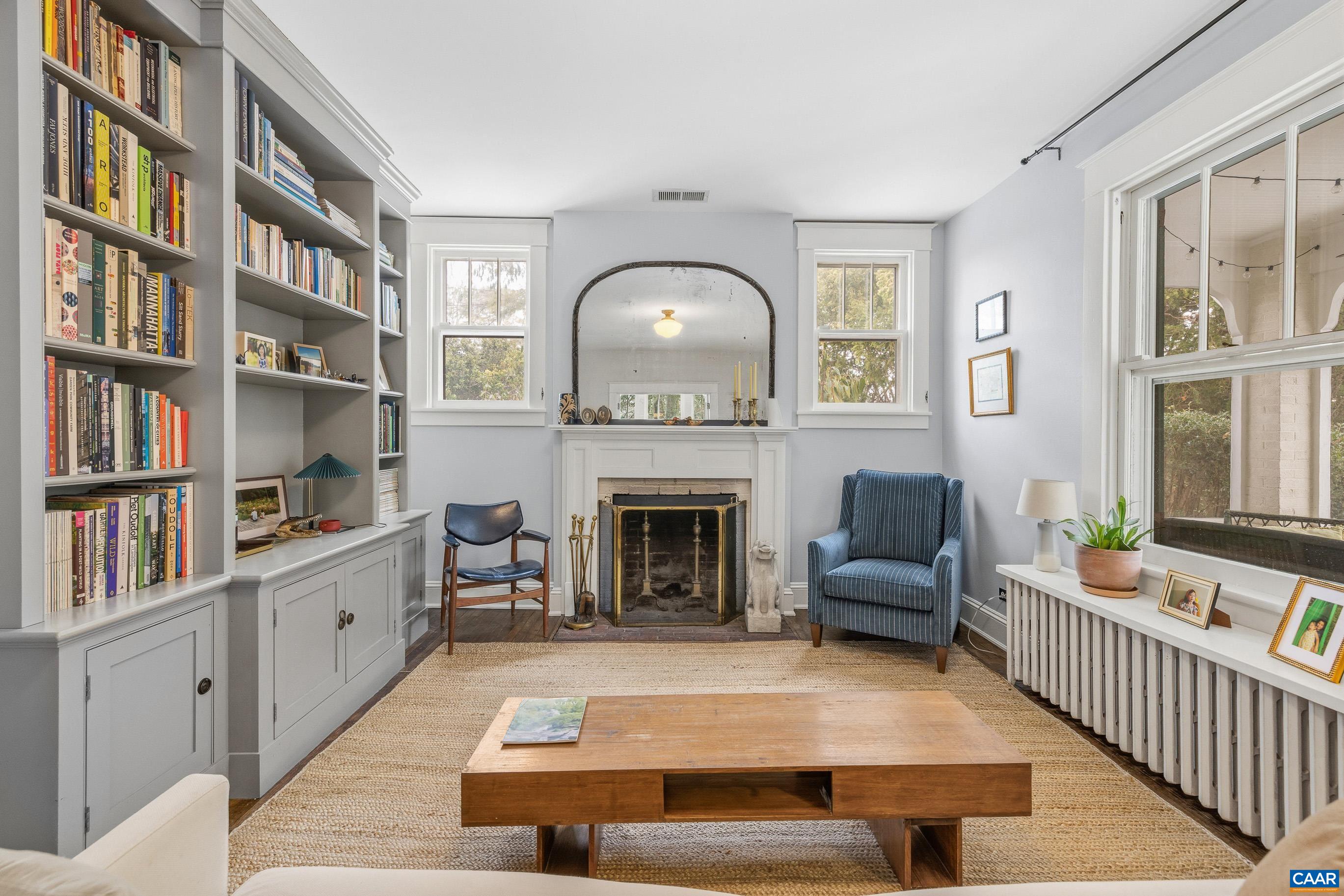 3 Buck Mountain Road Earlysville, VA 22936 - Photo 13 of 48 a living room with furniture and a fireplace