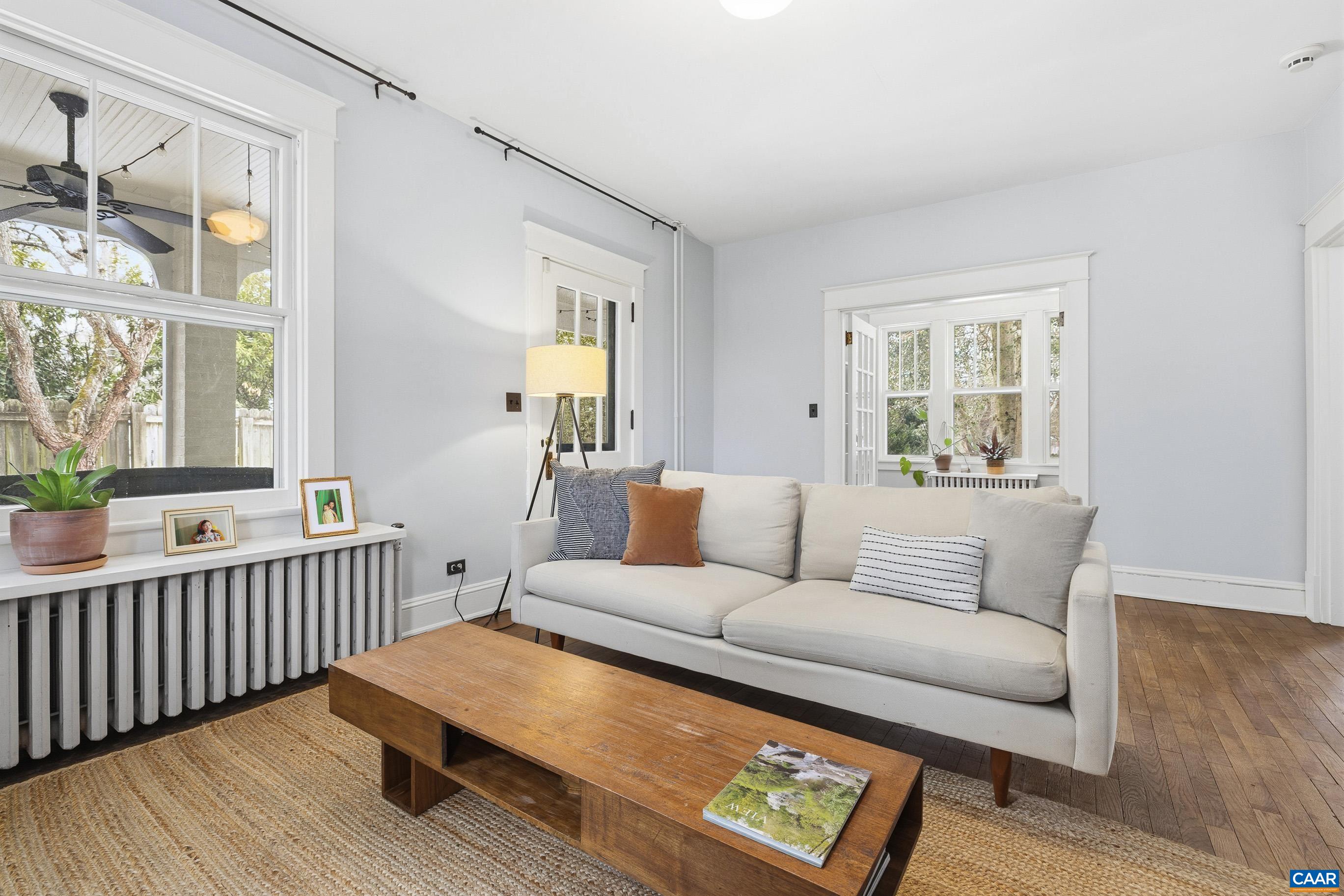 3 Buck Mountain Road Earlysville, VA 22936 - Photo 14 of 48 a living room with furniture and wooden floor