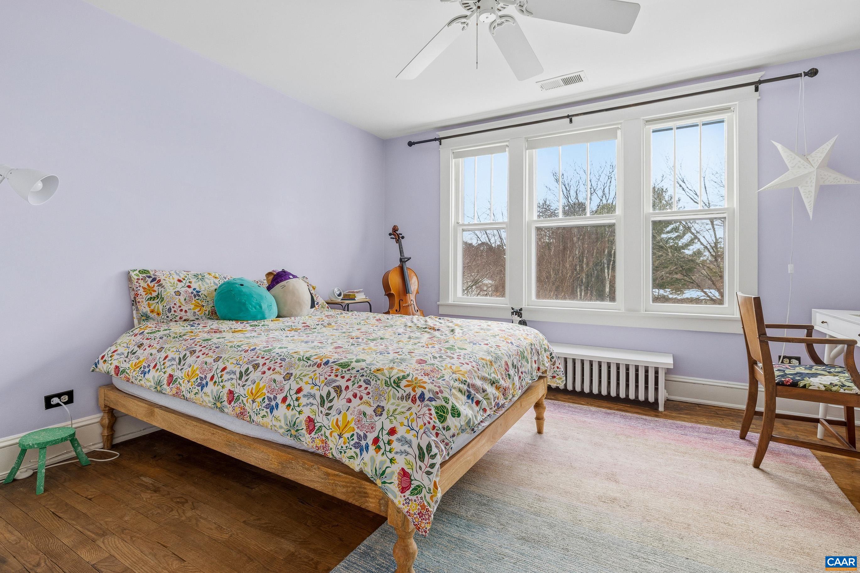 3 Buck Mountain Road Earlysville, VA 22936 - Photo 30 of 48 a bedroom with a bed chair and window