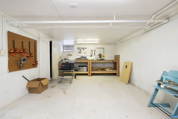 a bathroom with a tub and shower