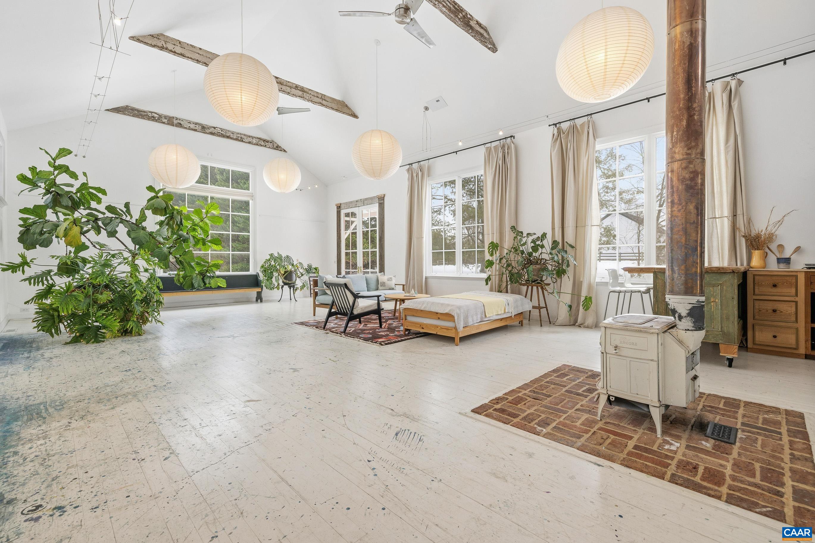 3 Buck Mountain Road Earlysville, VA 22936 - Photo 34 of 48 a living room with furniture and a large window