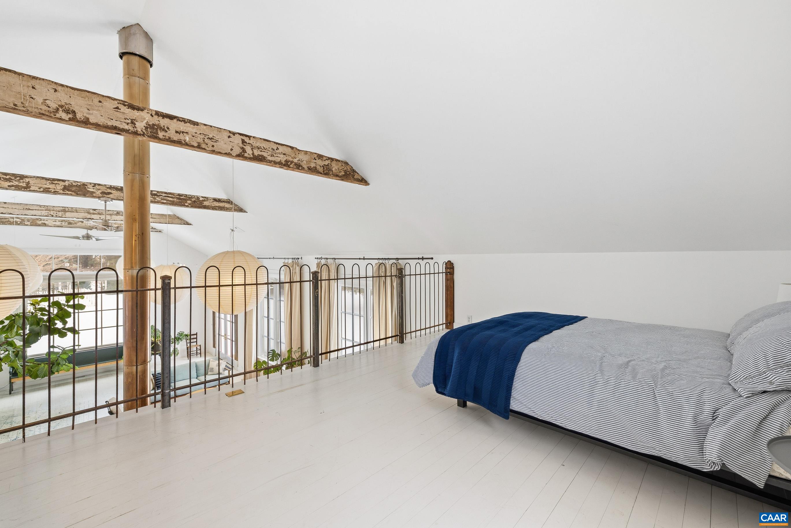 3 Buck Mountain Road Earlysville, VA 22936 - Photo 38 of 48 a living room with a couch and large window