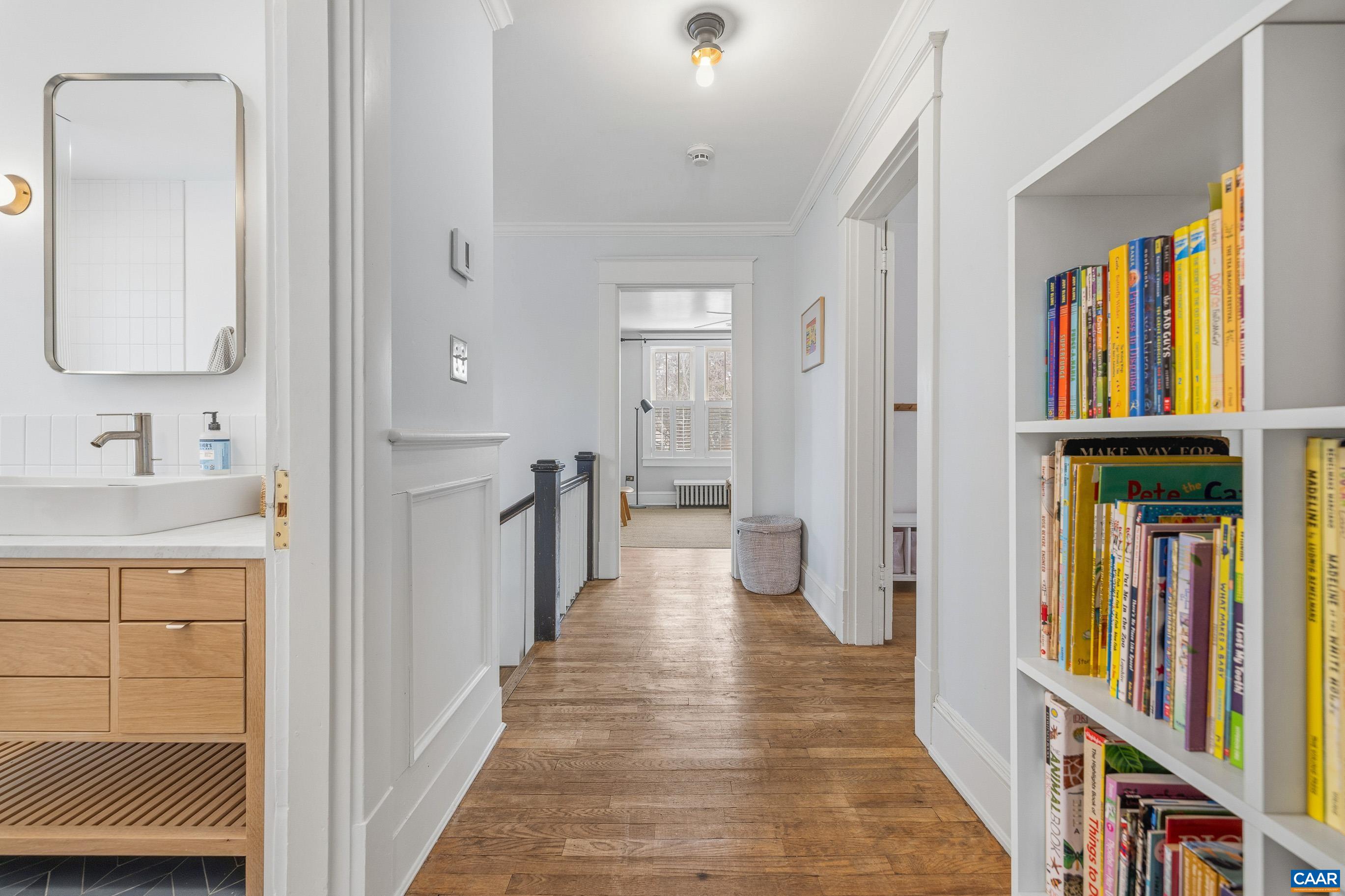 3 Buck Mountain Road Earlysville, VA 22936 - Photo 10 of 48 a hallway with wooden floor windows and entryway