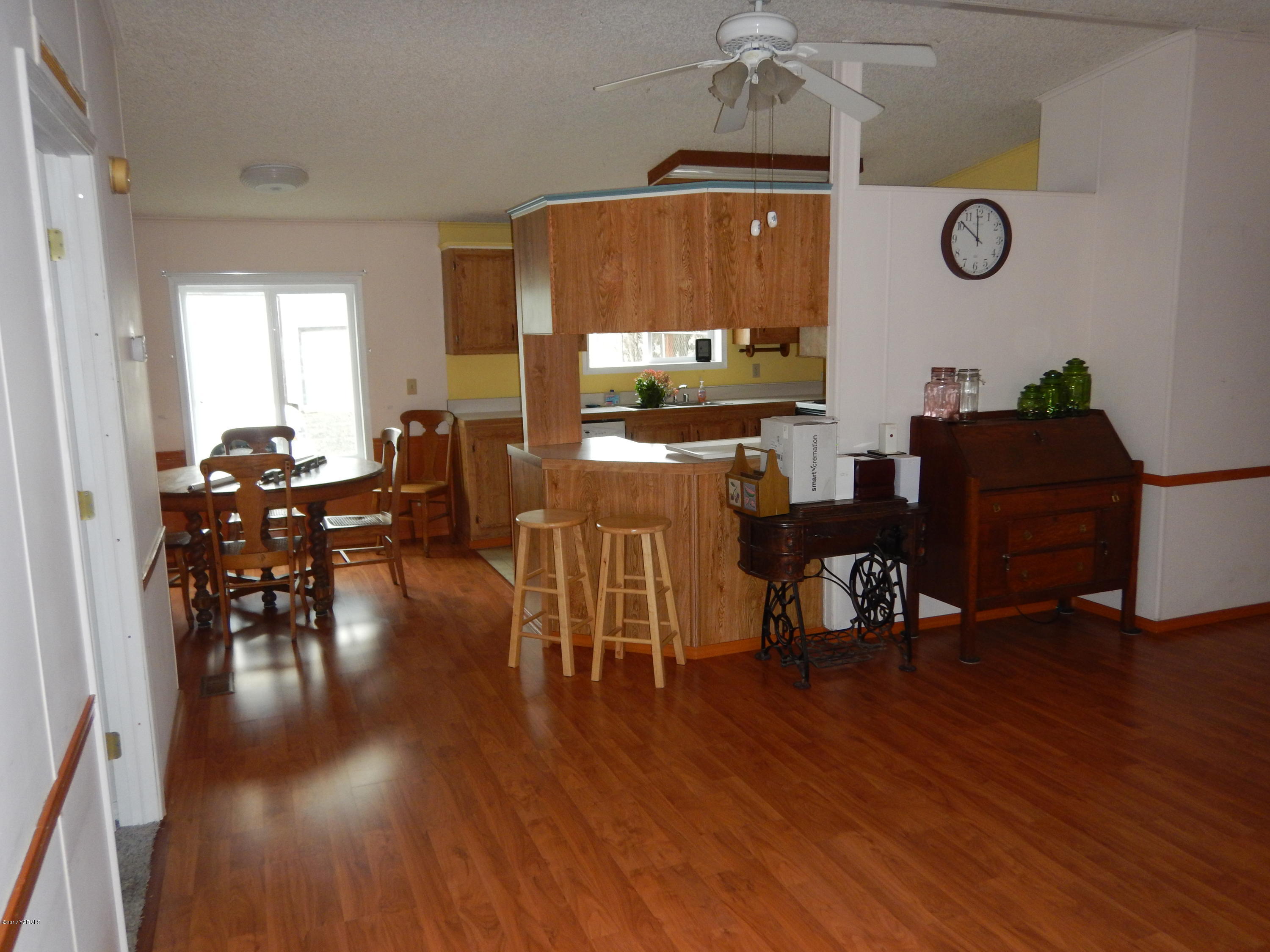 3404 South Stanton Road Yakima, WA 98903 - Photo 16 of 22 a living room with furniture and a wooden floor