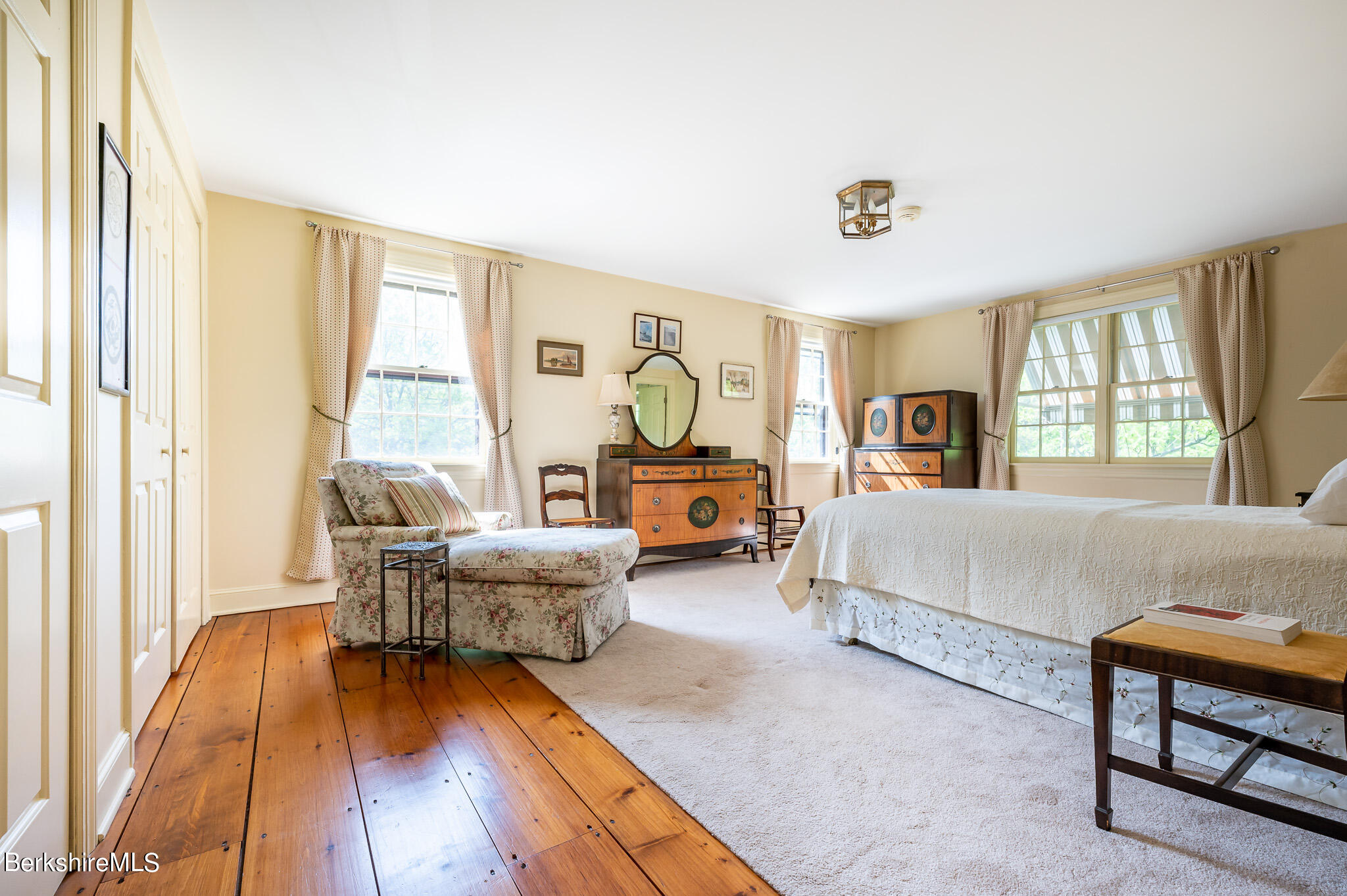 365 State Road Great Barrington, MA 01230 - Photo 18 of 34 a bedroom with furniture and a wooden floor