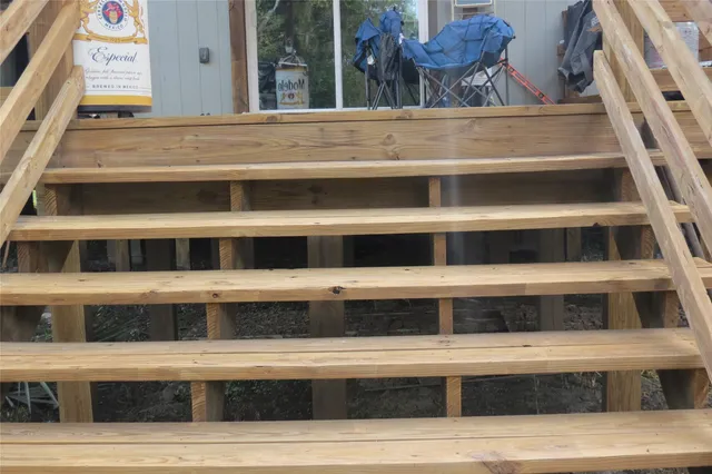 a view of a living room with a rug
