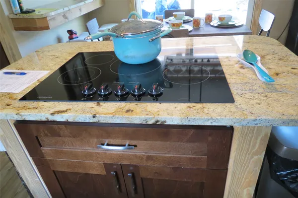 a room with water heater and a table