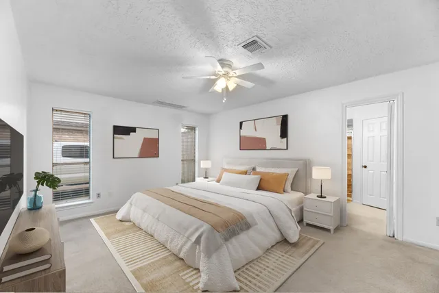 a bathroom with a sink and shower