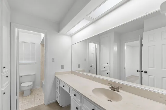 a view of a house with backyard and porch