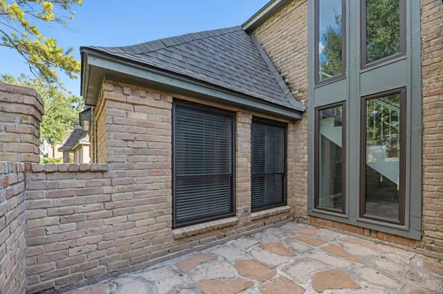 a view of a hallway with staircase
