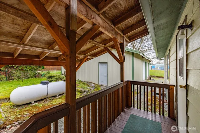 a view of balcony with furniture