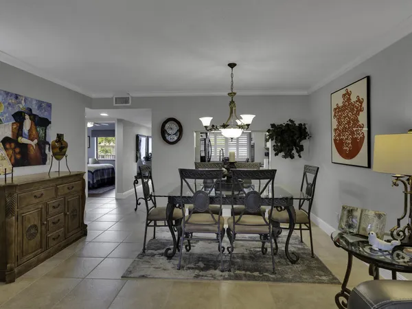 a view of a dining room with furniture