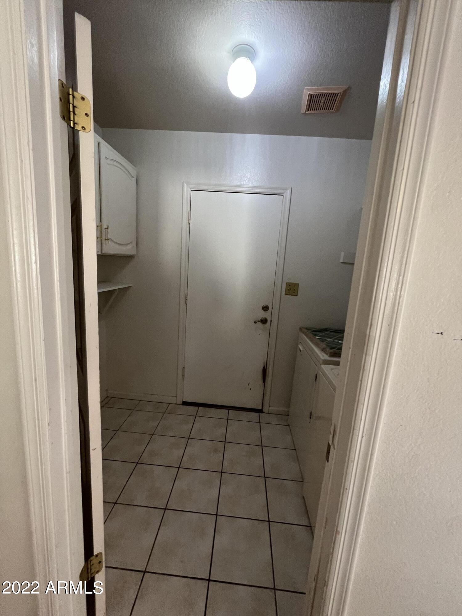 5505 East McLellan Road, Unit 56 Mesa, AZ 85205 - Photo 5 of 11 a bathroom with a granite countertop shower and a sink