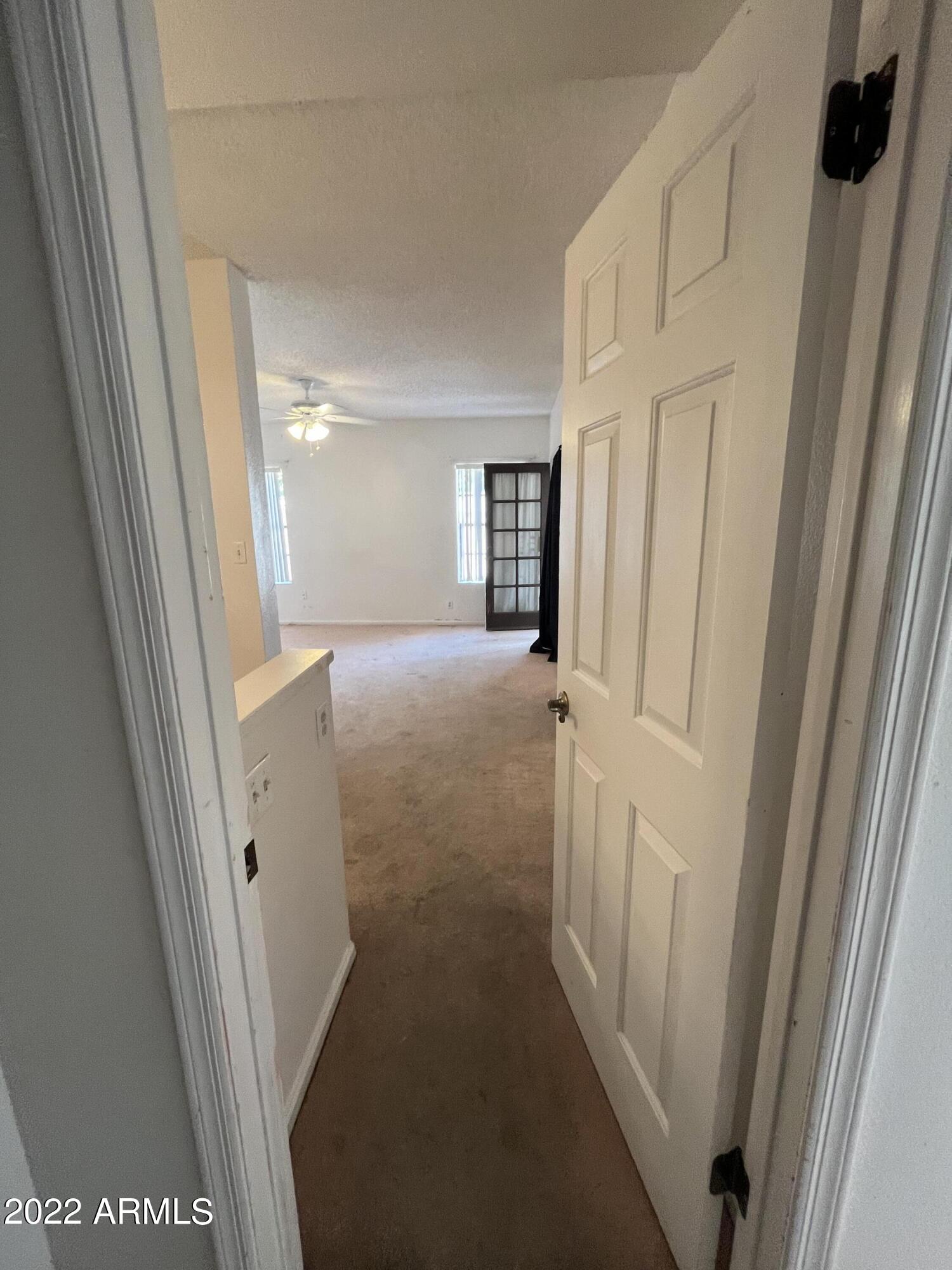 5505 East McLellan Road, Unit 56 Mesa, AZ 85205 - Photo 8 of 11 a view of a hallway