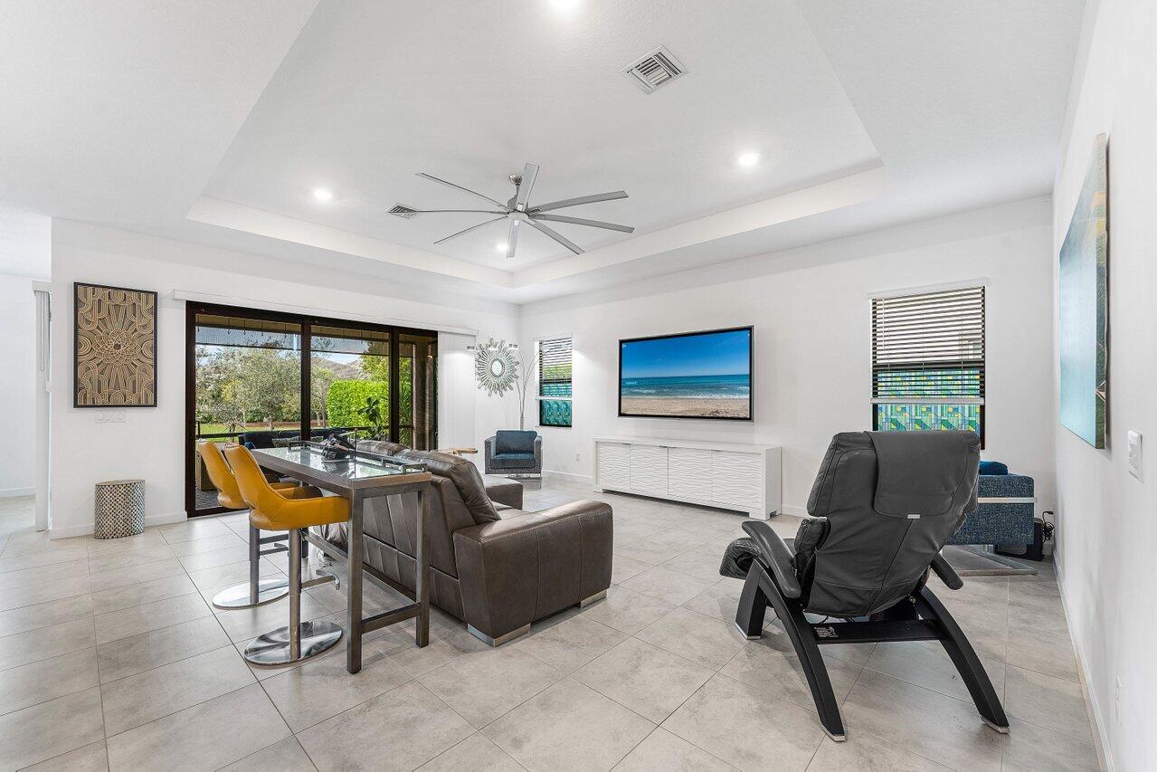 1119 Arrowhead Point Road Loxahatchee, FL 33470 - Photo 22 of 106 Great room opening to screened patio