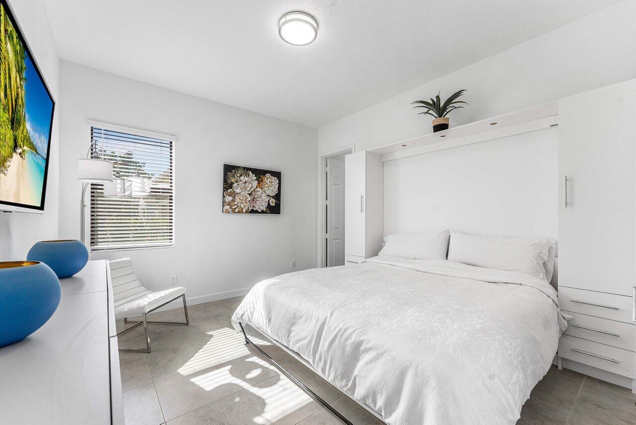 1119 Arrowhead Point Road Loxahatchee, FL 33470 - Photo 38 of 106 Ensuite bedroom w/King size murphy bed