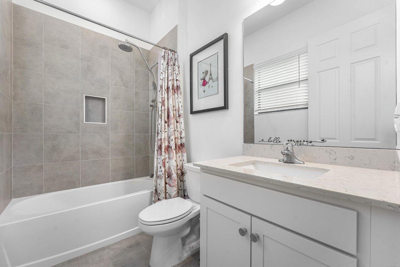 1119 Arrowhead Point Road Loxahatchee, FL 33470 - Photo 40 of 106 Ensuite bedroom