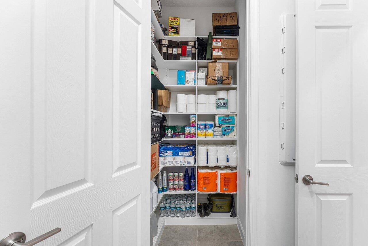 1119 Arrowhead Point Road Loxahatchee, FL 33470 - Photo 42 of 106 large closet in laundry room