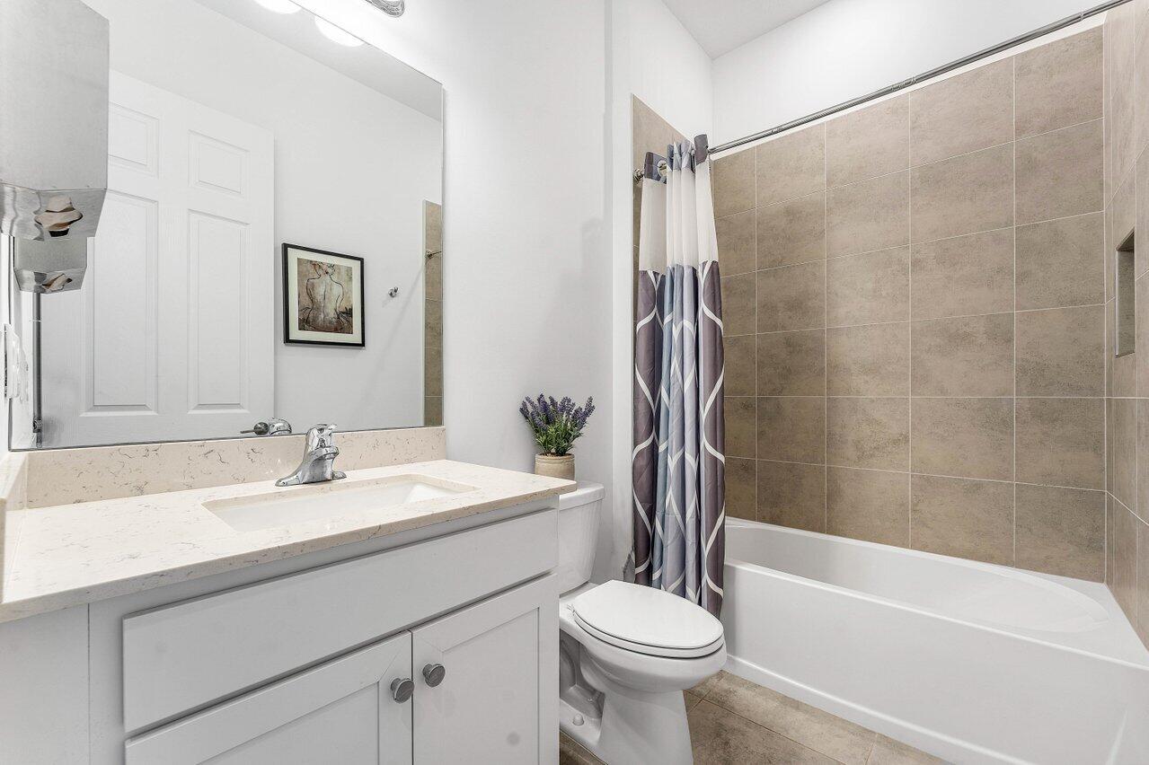 1119 Arrowhead Point Road Loxahatchee, FL 33470 - Photo 43 of 106 bathroom by 3rd bedroom