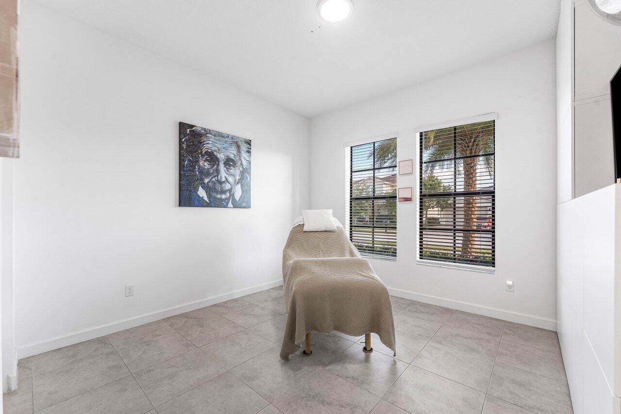 1119 Arrowhead Point Road Loxahatchee, FL 33470 - Photo 44 of 106 third bedroom w/customs cabinets