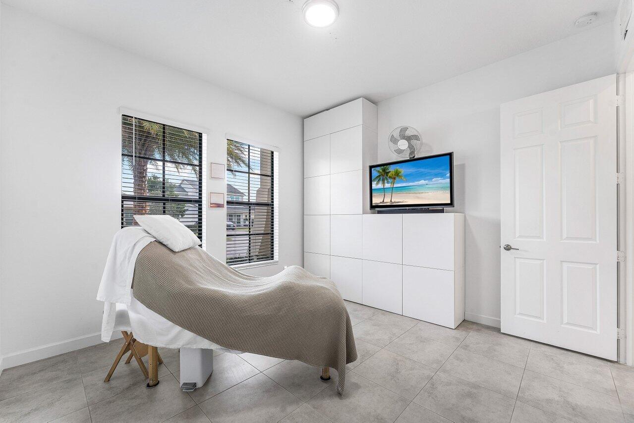 1119 Arrowhead Point Road Loxahatchee, FL 33470 - Photo 45 of 106 third bedroom-natural light