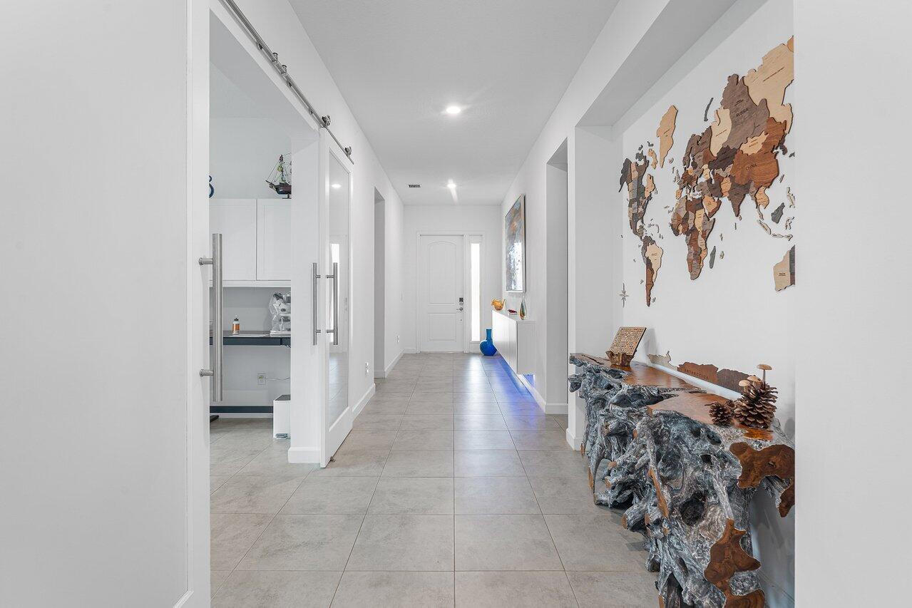 1119 Arrowhead Point Road Loxahatchee, FL 33470 - Photo 7 of 106 View of entry foyer and office/Flex