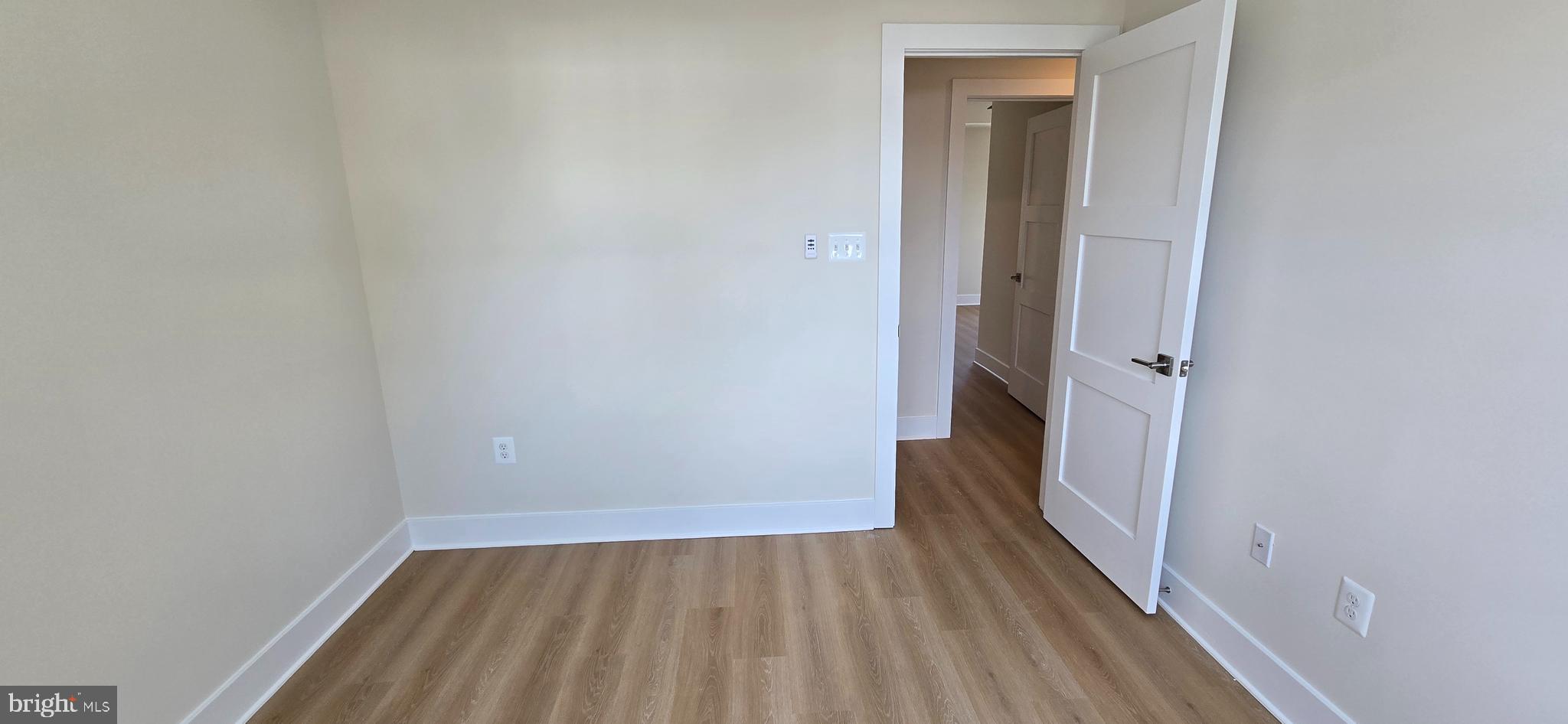 418 Chapel Alley, Unit 4 Frederick, MD 21701 - Photo 22 of 41 wooden floor in a gallery