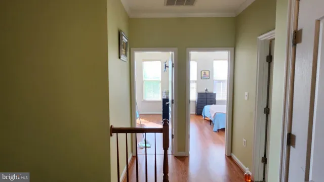 a view of a bathroom from a hallway