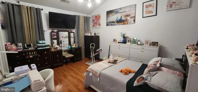 a bathroom with a sink vanity and a mirror